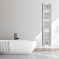 Flat chrome towel radiator mounted beside a bathtub.