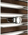 Chrome towel radiator installation detail.