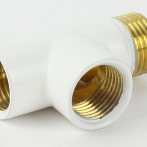 White plastic fitting with brass threaded ends on a white background