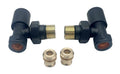 Set of black and brass plumbing connectors on a white background