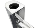 Close-up of a chrome towel radiator rail and pipe connection.