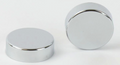 Two chrome circular objects on a white background
